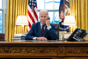 Washington DC, USA - January 24 2023, : US President Joe Biden in the Oval Office of the White House, talking on the phone